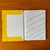 CAD. BROCHURA 1/4 96 FOLHAS ENCAPADO AMARELO LISO - comprar online