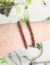 Pulseira esfera granada 6mm - A pedra da paixão e energia - comprar online