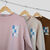 buzo day social - tienda online