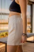 Shorts alfaiataria cintura alta bolso quadrado externo - Mari Telli