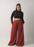 Calça de moletinho pantalona terracota com elástico na cintura e bolsos fundos