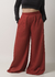 Calça de moletinho pantalona terracota com elástico na cintura e bolsos fundos