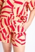 shorts estampado cintura alta com bolsos frontais e elástico atrás