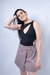 Body feminino preto com recortes e decote assimétrico