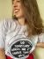 Camiseta unissex com uma estampa de capacete de astronauta
