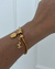 PUL483 - PULSEIRA BERLOQUE CASINHA DOG - FOLHEADO A OURO 18k - comprar online