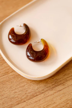 Brinco Maxi Curva Marrom na internet