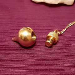 pendulo de bronce modelo mermet con testigo, marca Hermes