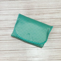 Cambiador portátil aqua con lunares