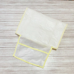 Cambiador portátil rayadito blanco & amarillo - Nido Encantado - Tienda de Bebés Online