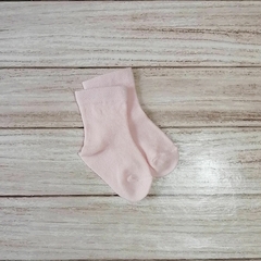 par de medias 3/4 en rosa bebé