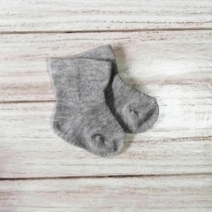 par de medias 3/4 en gris