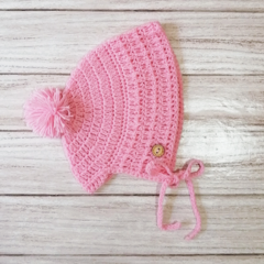 Capotita tejida de lana en Rosa