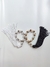 Enfeite pérolas com tassel
