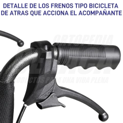 Detalle del freno tipo bicicleta de la silla de ruedas de traslado, mostrando el mango y el mecanismo de acción para el acompañante.