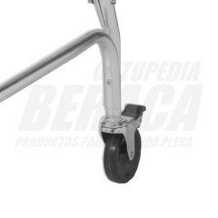 Rueda trasera giratoria con freno para silla de ruedas higiénica, mostrando el mecanismo y soporte metálico.