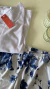 Pijama Julia Short de manga corta en color blanco con pantalones cortos estampados en flores azules.