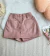 Short saia couro fake importado na internet
