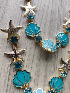 V Concha Resina AZUL COM STRASS AZUL na internet