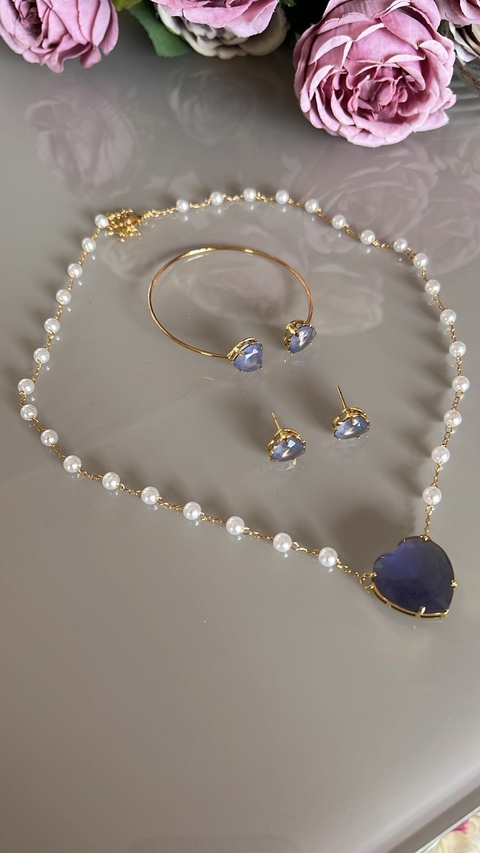 Conjunto Lumiar perola e dourado com coração roxo