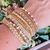 Mix de Pulseiras Dourada com Tons Marfim - comprar online