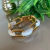 bracelete resinado dourado com branco