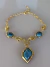 Colar dourado verniz italiano linha premium resina azul - comprar online