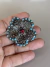 Broche flor grafite strass turquesa com pink na internet