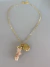 Colar resort dourado longo concha dourada e alga resina nude - comprar online