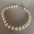 colar perolas detalhe dourado M