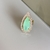 Anel gota pedra fusion verde banho dourado Alice regulável na internet