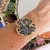 Conjunto bracelete e brinco Ísis poá Preto com zirconia verde - comprar online