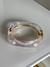 Bracelete dourado com cristal transparente verniz italiano na internet