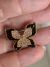 Broche dourado borboleta preta com strass cristal - comprar online