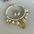 conjunto Sereia Búzio Dourado pedras e strass - loja online