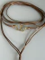 Colar fio amarrado marrom country com entremeio ferradura dourada - comprar online