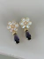 Brinco dourado linha festa Zircônia cristal com pedra gota Roxo tipo ametista e pino com flor cristal na internet