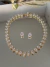 Conj colar e brinco dourado com gota zircônia cristal Bijouteria