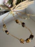 Colar dourado verniz italiano pedra natural irregular olho de tigre longuinho - comprar online