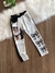 Calça Infantil em Cotelê Lulu com Pompom Preto e Branco Yoyo 25223 - comprar online