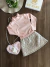 Conjunto Infantil Blusa Rosa em Ribana Canelada com Gola e Short Saia em Matelassê Brilhoso Up Baby 120745771 na internet