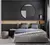 Quarto moderno com Espelho Moon com moldura acima da cama.