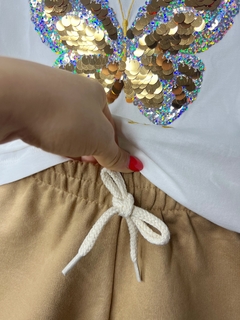 Conjunto borboleta paetê dourado na internet