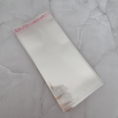 BOLSA TRANSPARENTE CON ADHESIVO 8cm x 15cm - PAQ. 100 - HE22
