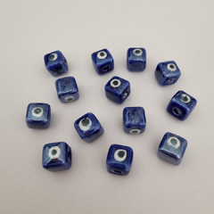 CERAMICA CUBO OJITO AZUL OSCURO - UND - CE113