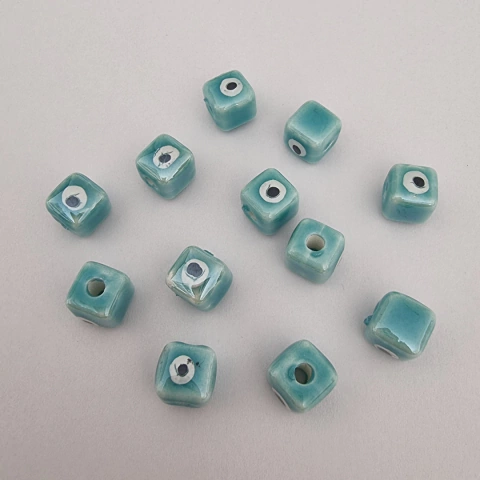 CERAMICA CUBO OJITO TURQUESA - UND - CE108