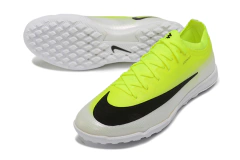 Chuteira Society Nike Mercurial Vapor 17 Elite amarela com detalhes em branco e preto vista de lado