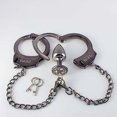 KIT ALGEMAS COM PLUG ANAL CRAVEJADO COM STRASS TAMANHO P 6,5cm HARD - FÁBRICA DA SEDUÇÃO