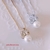 Colar Laço de Zircônias e Pérola Banhado no Ouro 18 e no Ródio Branco - comprar online