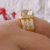 Anel Caroline Pedra de Zircônia Central e Mini Zirconias Banhado a Ouro 18k na internet